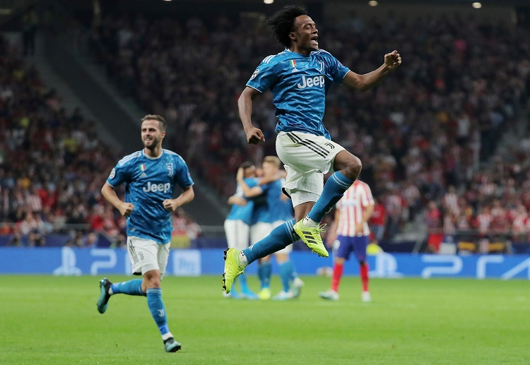 Juan Cuadrado scores a first-half goal to give Juventus a 0-1 lead in Champions League game against Aletico