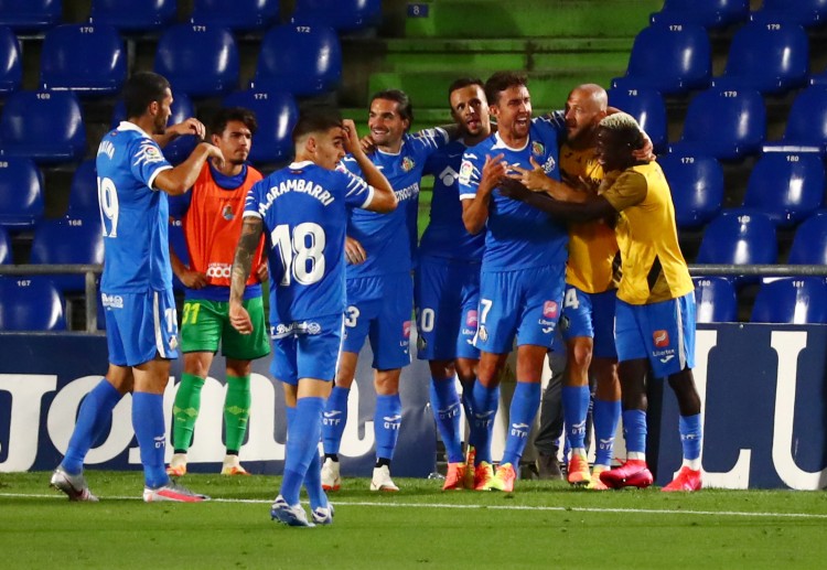 Konsistensi Real Madrid di puncak klasemen akan diuji oleh perjuangan keras Getafe meraih tiket Liga Champions