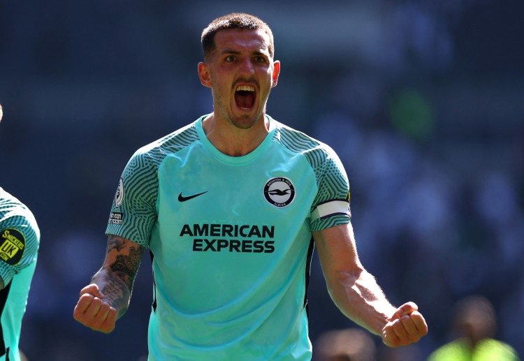 Brighton & Hove Albion's Lewis Dunk aims to score against Manchester City in the Premier League