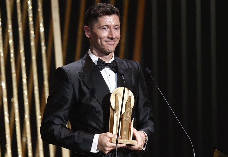 Barcelona's Robert Lewandowski receives the Gerd Muller award in the 2022 Ballon d'Or ceremony